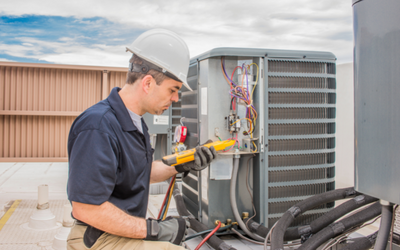 HVAC contractor making an HVAC repair